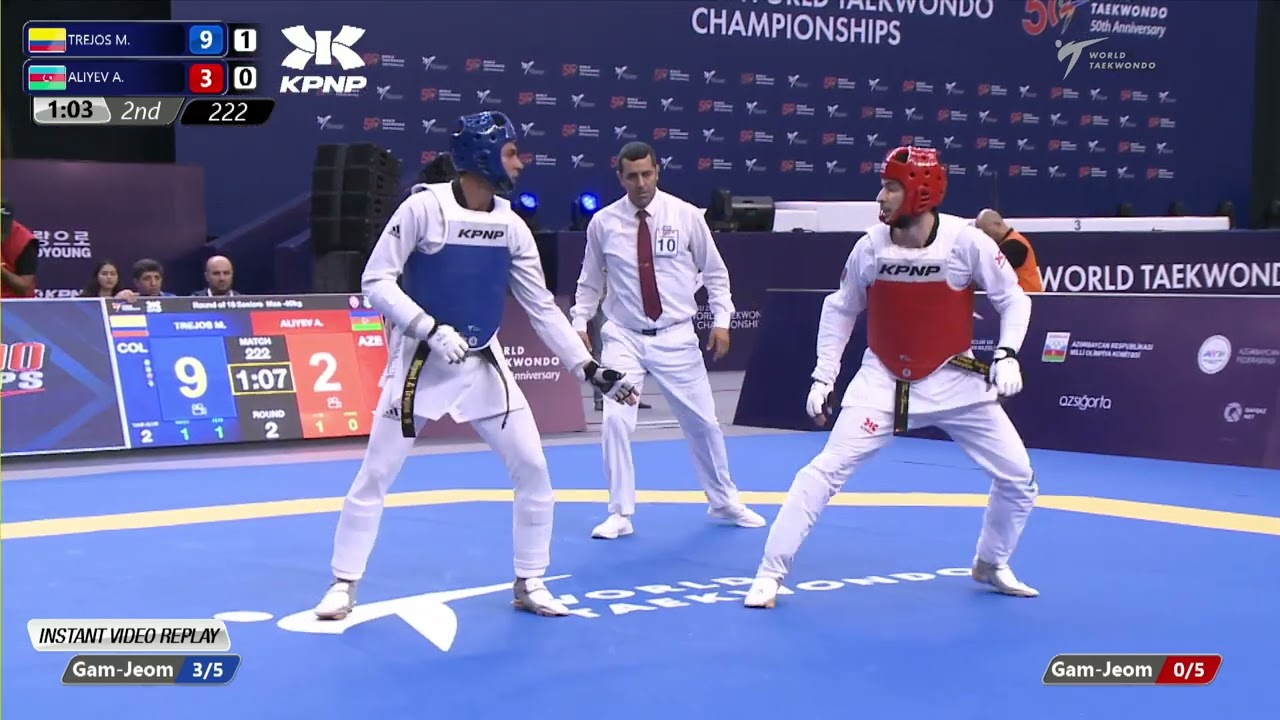 222 R16 Men 80kg COL TREJOS M AZE ALIYEV A background