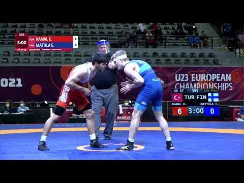 1/4 GR - 67 kg: K. KAMAL (TUR) v. E. MATTILA (FIN) background