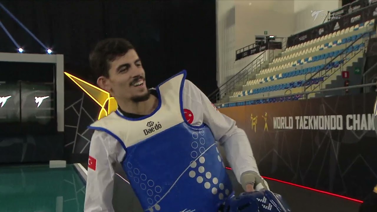104 M-74kg R-64 YILDIZ M. E. TUR 🔵 vs 🔴 POLLARD I. TTO I Guadalajara 2022 WT Championships background