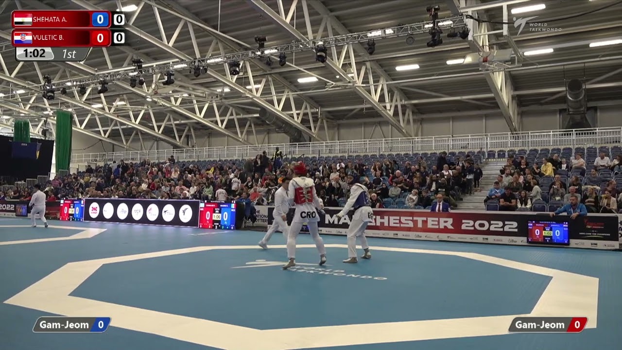 306 R-32 W-67kg 🔵 SHEHATA Aya EGY vs 🔴 VULETIC Bruna CRO I Manchester 2022 World Taekwondo GP background