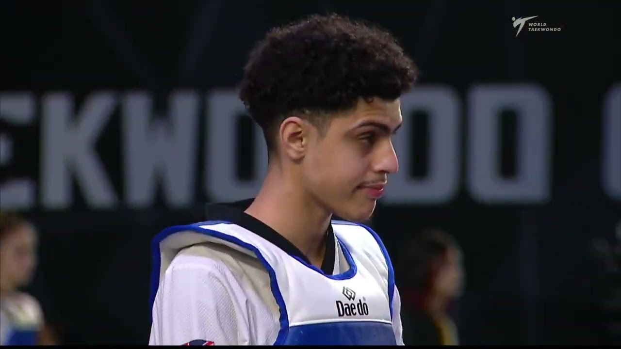 305 M-58kg R-64 NOUR M. GBR 🔵 vs 🔴 MOUBELE IPOPA A. GAB I Guadalajara 2022 WT Championships background