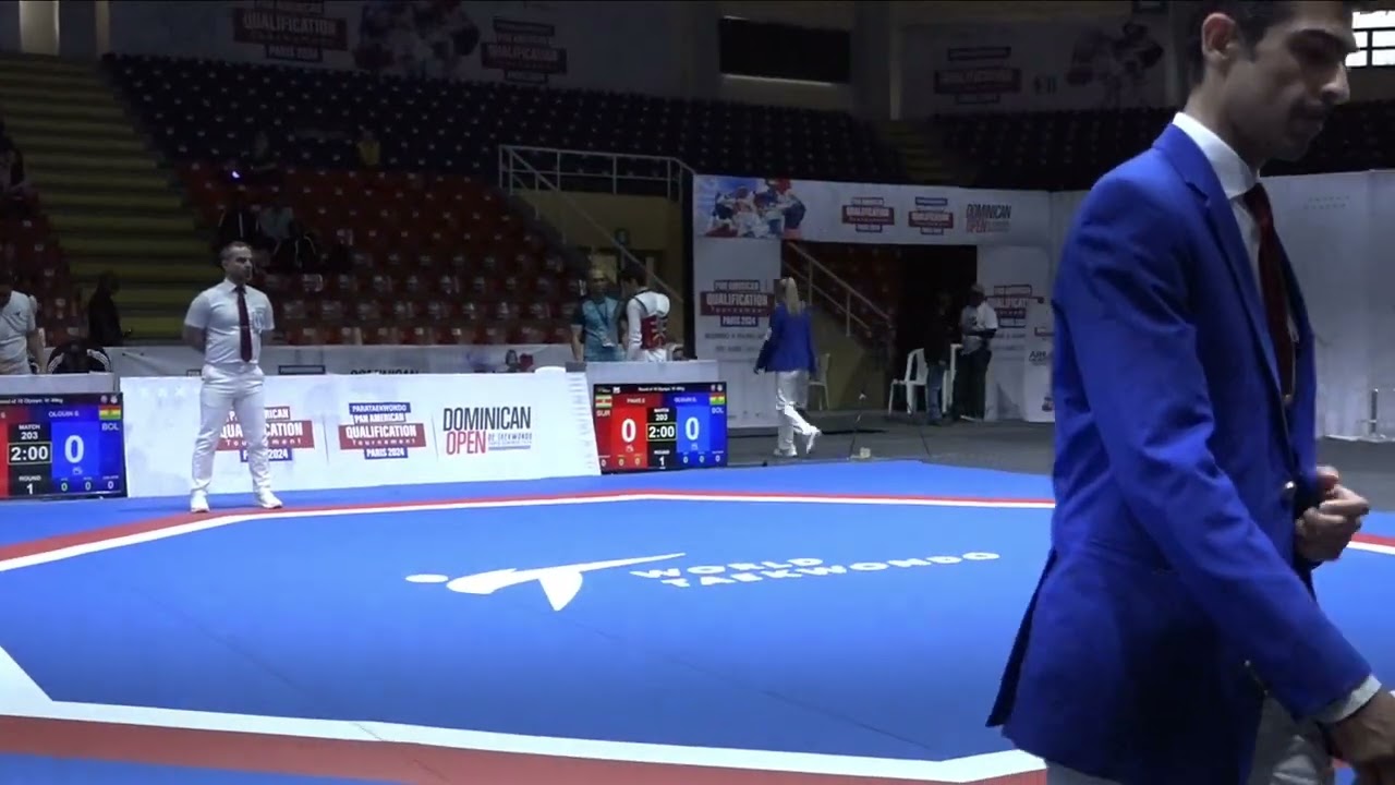 203 Round of 16 M 68kg BOL OLGUIN S SUR PINAS S background