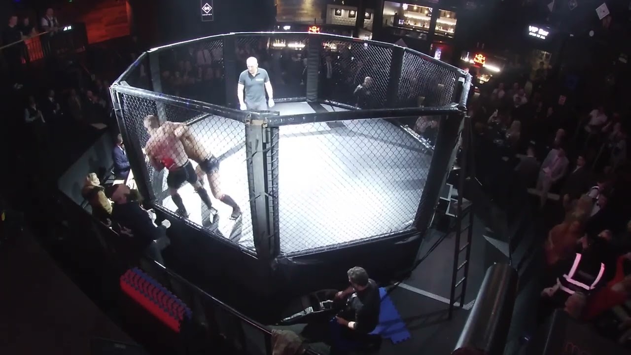 Ultra MMA | Southampton | Rafal Wojcik V Jamie Cousins background