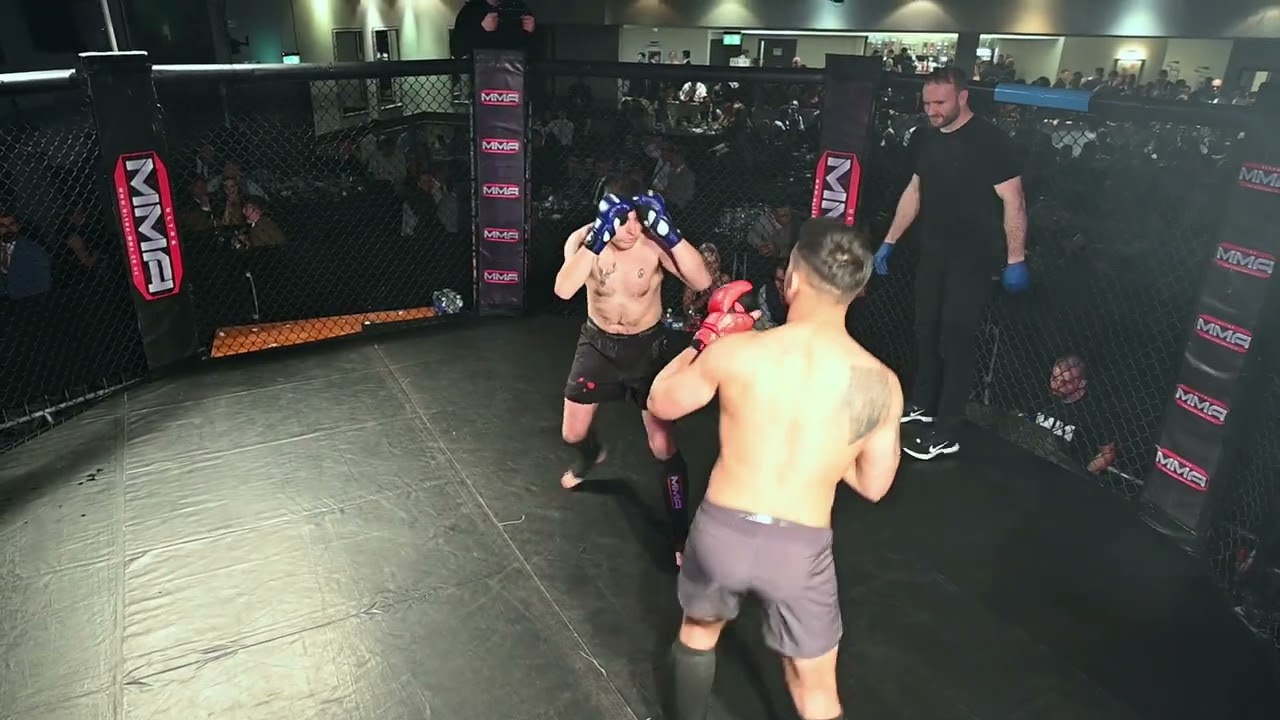 ULTRA MMA GLASGOW 201122 FIGHT 28 UZZAIR TOUFIQUE VS CHRIS MAJOR background
