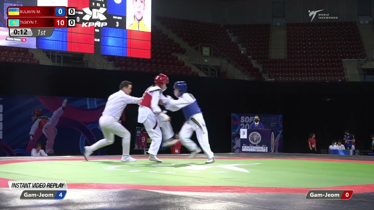 310 R32 Boys 41kg UKR BULAVIN M KAZ TASKYN T background