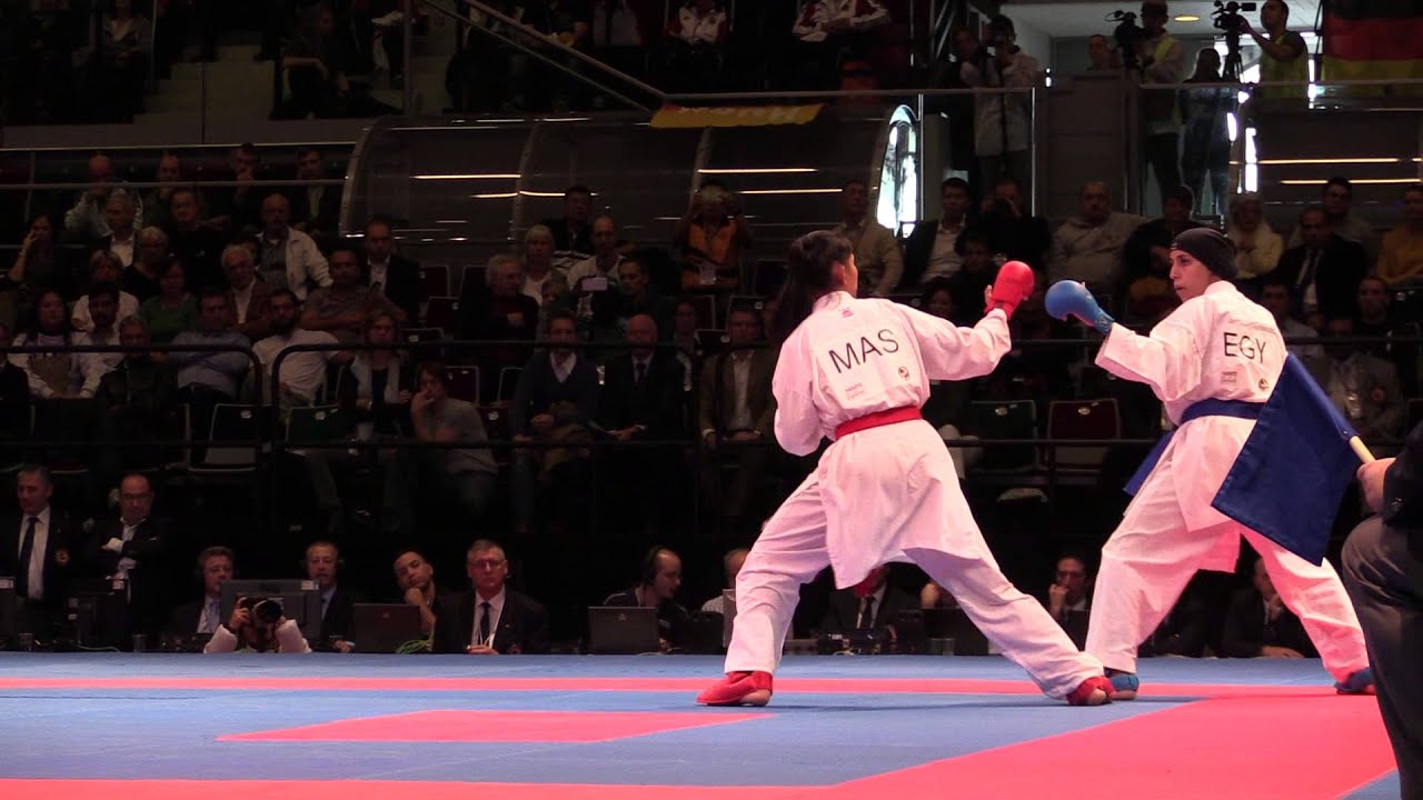 Salni JEFRY vs Giana LOTFY, gold medal fight Kumite -61 Kg. 2014 World Karate Championships background