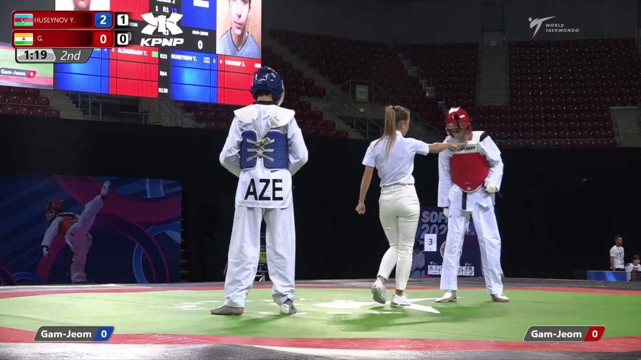 324 R16 Boys 61kg AZE HUSEYNOV Y IND G background