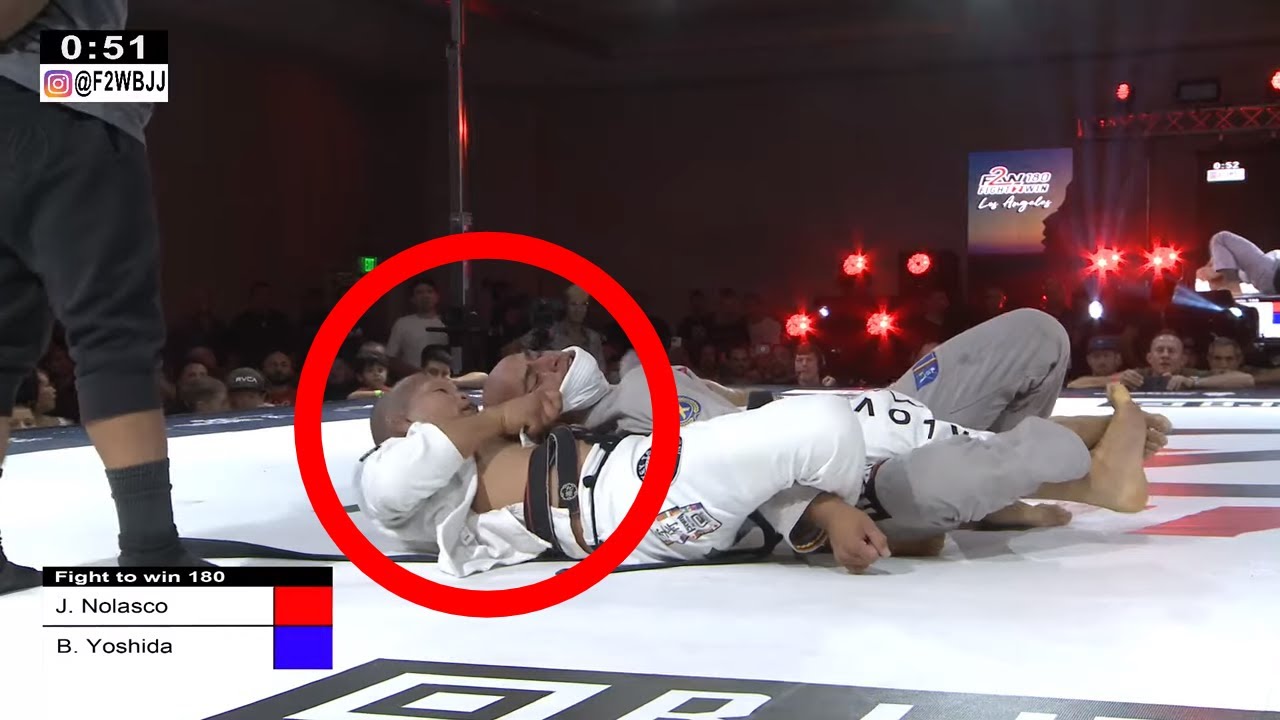Baret Yoshida sinks a beautiful assassin choke background