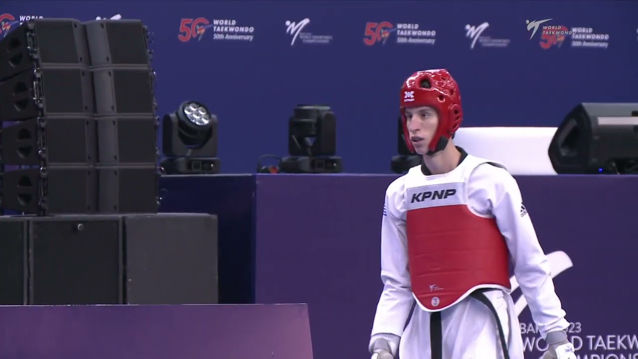 219 Quarter final Men 54kg KOR PARK T J GRE DIMITROPOULOS K background