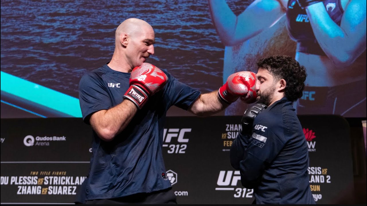 Sean Strickland spars fan at the UFC 312 open workouts in Sydney | MMA Fighting background