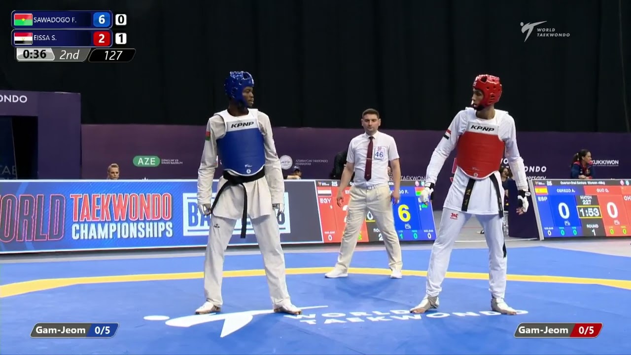 127 Quarter final Men 80kg BUR SAWADOGO F EGY EISSA S background