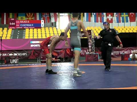 Qual. FS - 74 kg: B. BALAZS (HUN) v. P. CIURZYNSKI (POL) background