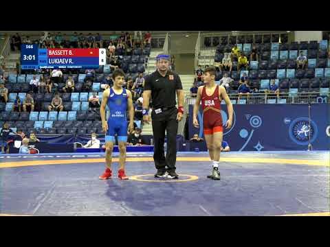 Qual. GR - 45 kg: B. BASSETT (USA) v. R. LUKIAEV (RUS) background
