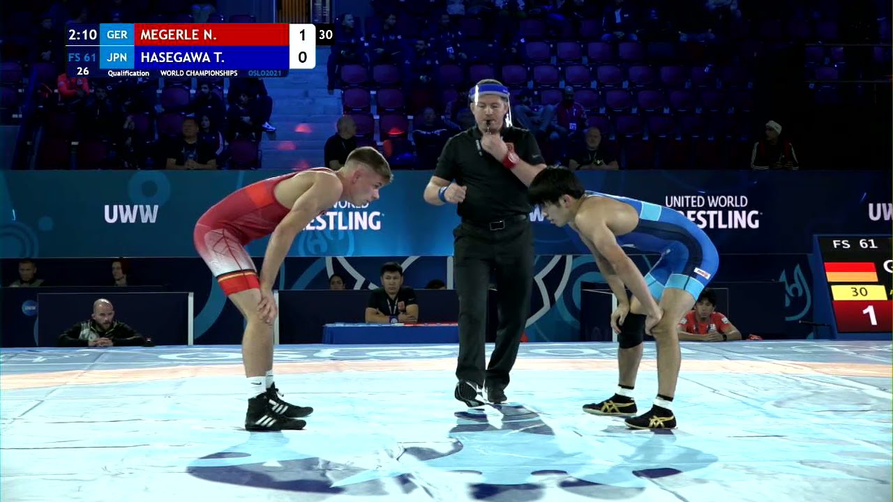 Qual. FS - 61 kg: N. MEGERLE (GER) v. T. HASEGAWA (JPN) background