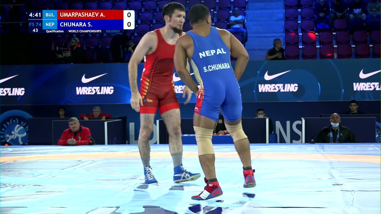 Qual. FS - 74 kg: A. UMARPASHAEV (BUL) v. S. CHUNARA (NEP) background