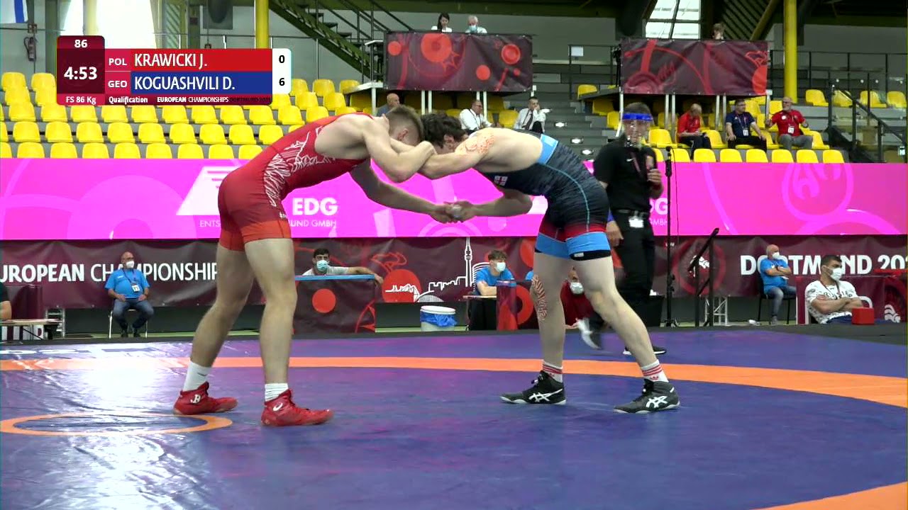 Qual. FS - 86 kg: J. KRAWICKI (POL) v. D. KOGUASHVILI (GEO) background