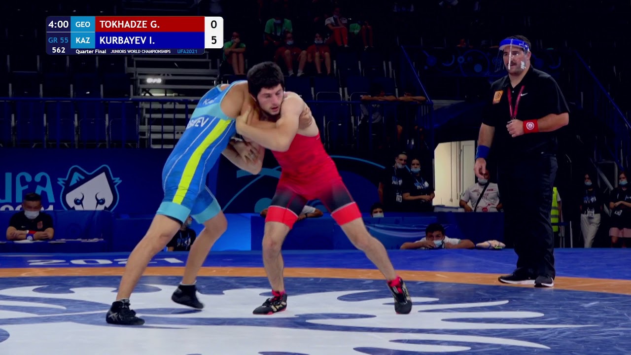 1/4 GR - 55 kg: G. TOKHADZE (GEO) v. I. KURBAYEV (KAZ) background