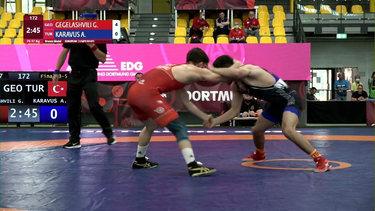 BRONZE FS - 57 kg: G. GEGELASHVILI (GEO) v. A. KARAVUS (TUR) background