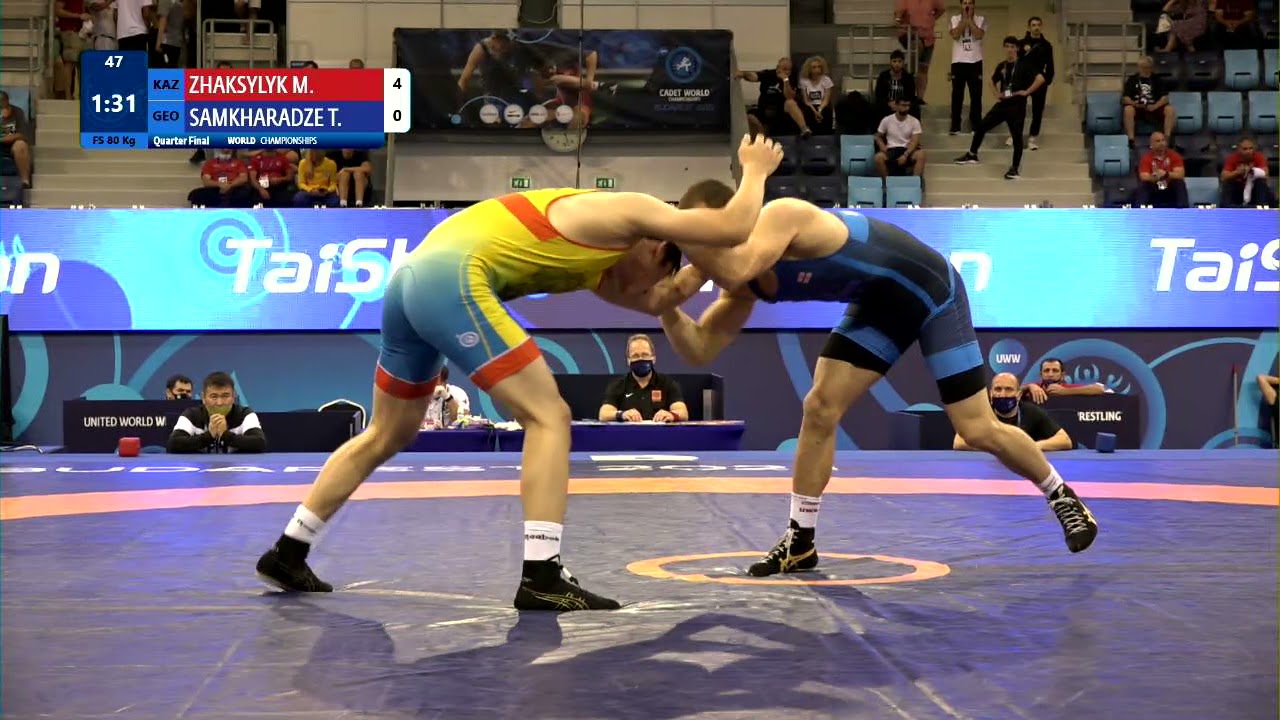 1/4 FS - 80 kg: M. ZHAKSYLYK (KAZ) v. T. SAMKHARADZE (GEO) background