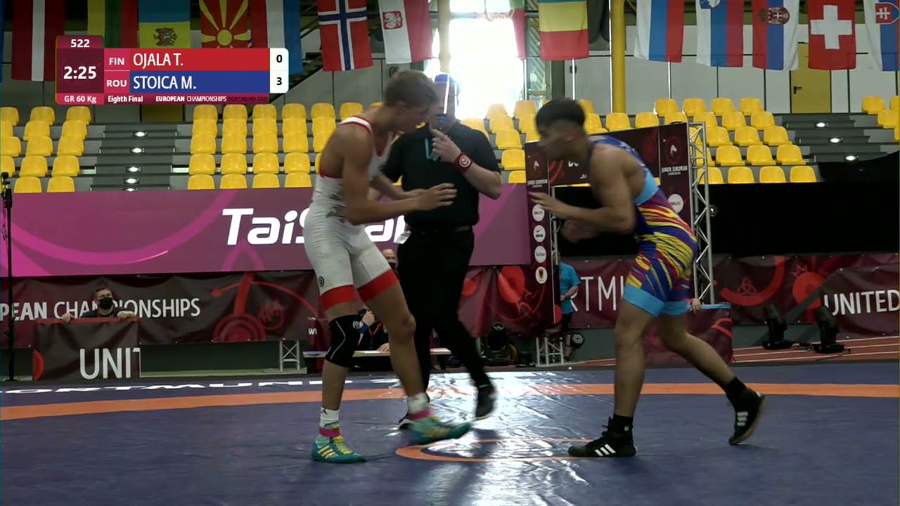 1/8 GR - 60 kg: T. OJALA (FIN) v. M. STOICA (ROU) background