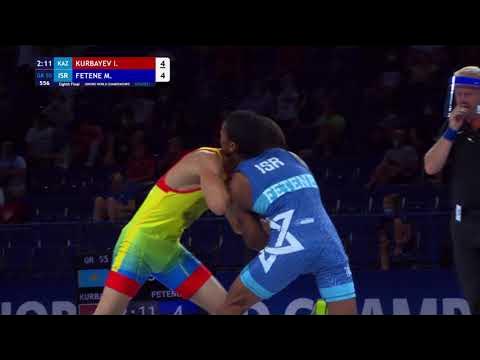 1/8 GR - 55 kg: I. KURBAYEV (KAZ) v. M. FETENE (ISR) background