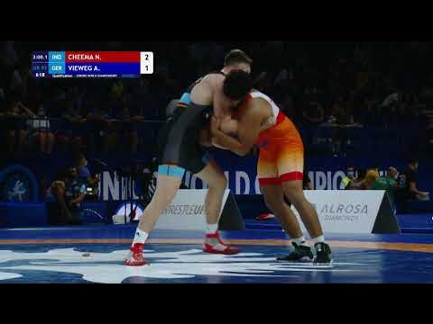 Qual. GR - 97 kg: N. CHEEMA (IND) v. A. VIEWEG (GER) background