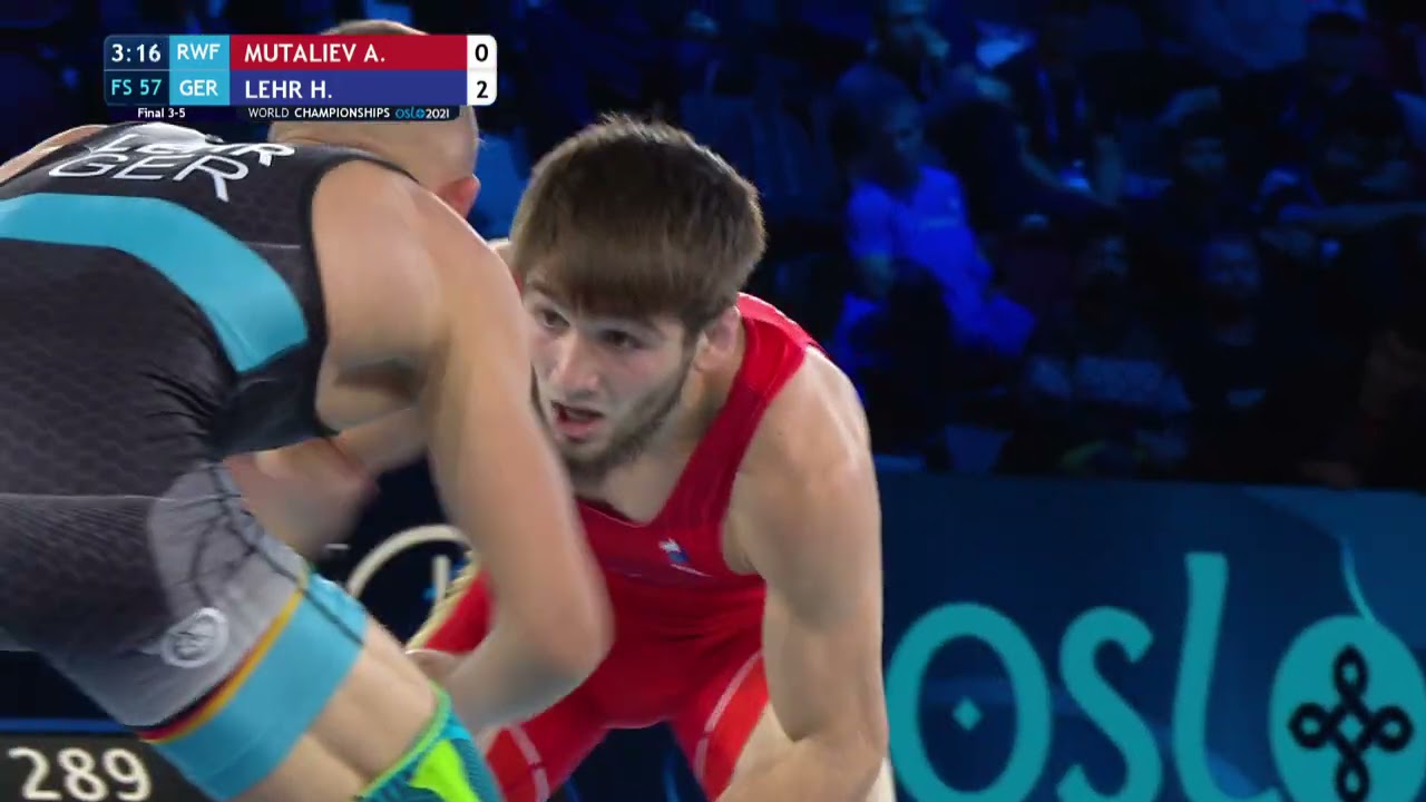 BRONZE FS - 57 kg: A. MUTALIEV (RWF) v. H. LEHR (GER) backdrop