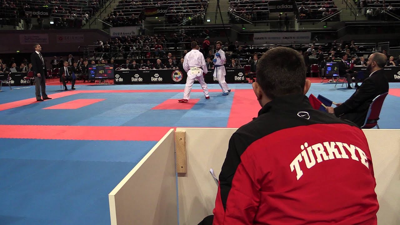 MACEDONIA vs TUKEY. Male Team Kumite Competition. 2014 World Karate Championships background