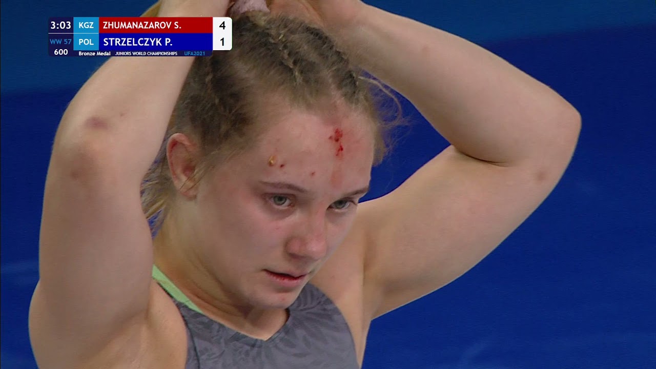 BRONZE WW - 57 kg: S. ZHUMANAZAROV (KGZ) v. P. STRZELCZYK (POL)