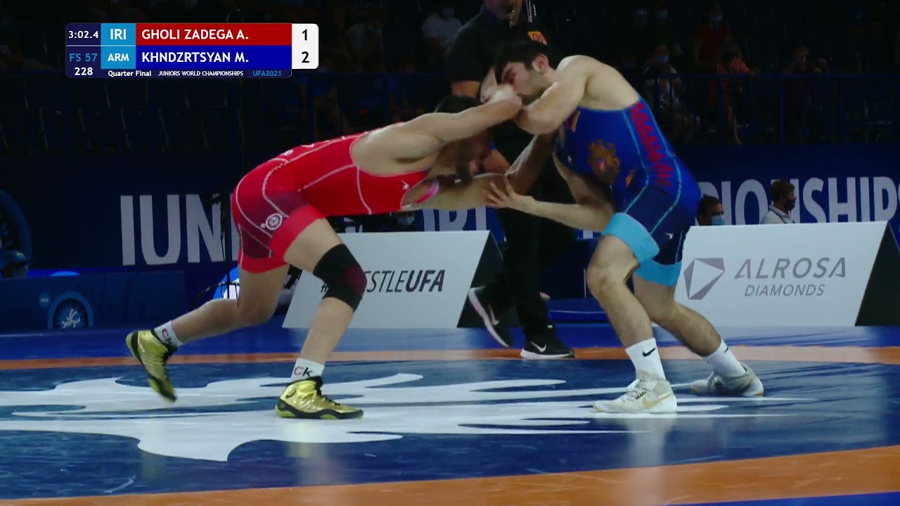 1/4 FS - 57 kg: A. GHOLI ZADEGA (IRI) v. M. KHNDZRTSYAN (ARM) backdrop