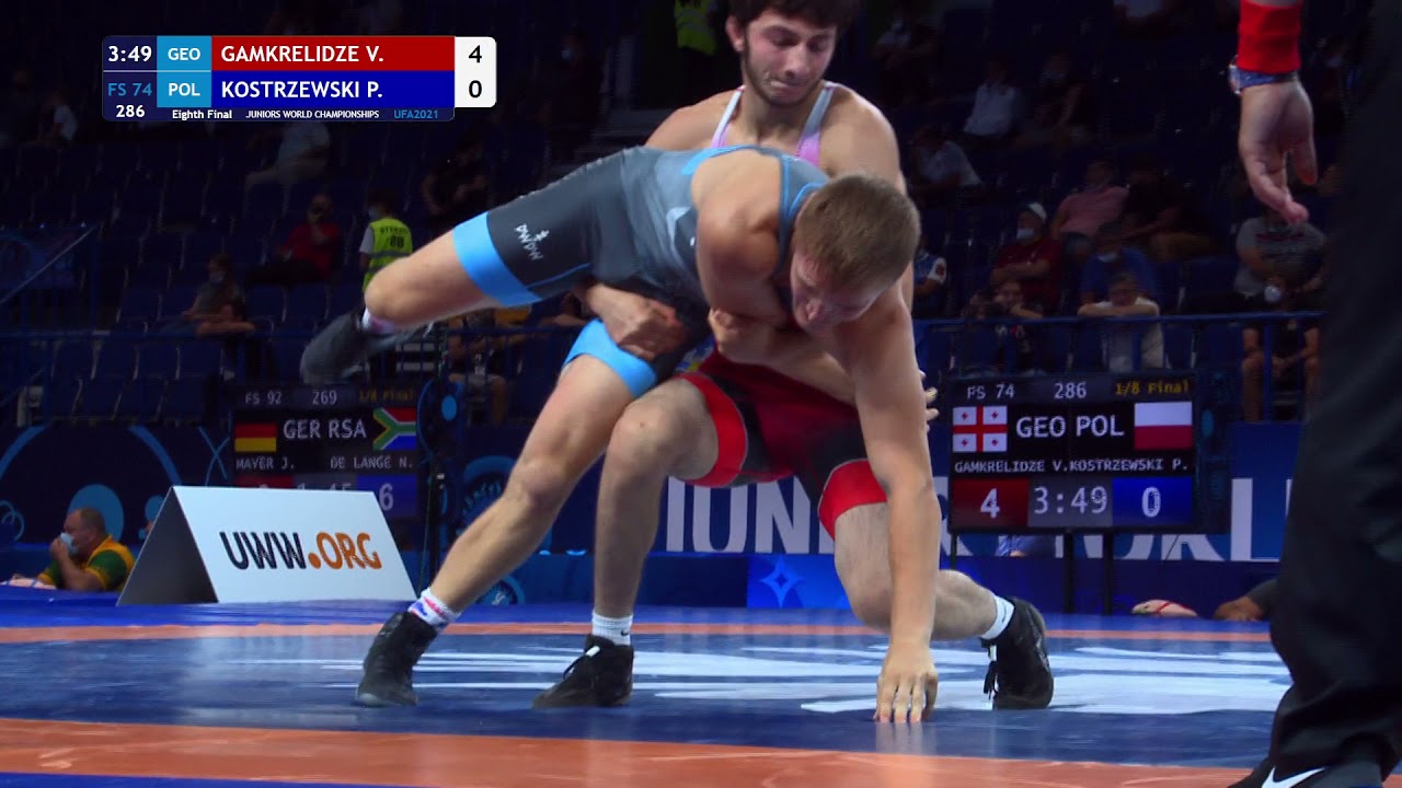 1/8 FS - 74 kg: V. GAMKRELIDZE (GEO) v. P. KOSTRZEWSKI (POL) background