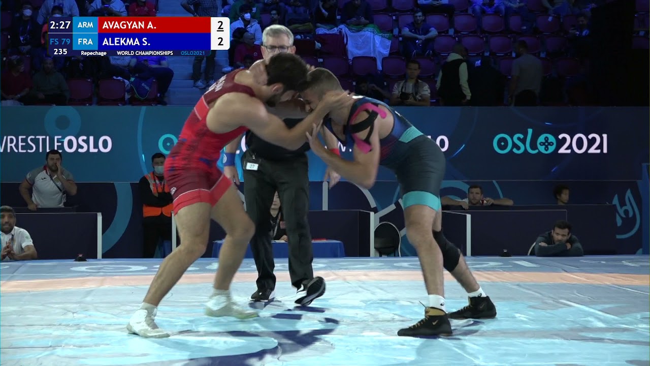 Repechage FS - 79 kg: A. AVAGYAN (ARM) v. S. ALEKMA (FRA) background