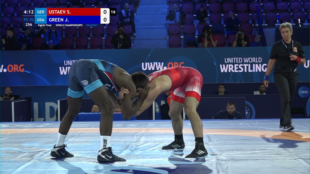 1/8 FS - 70 kg: S. USTAEV (GER) v. J. GREEN (USA) background