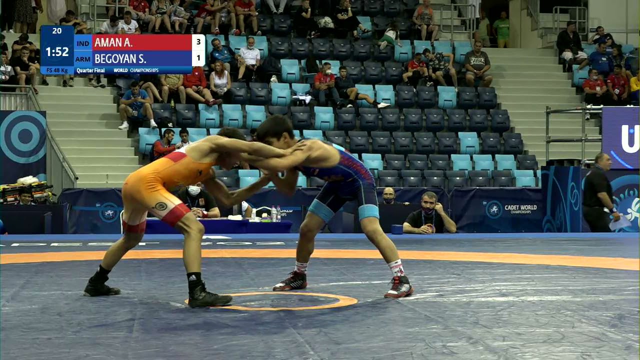 1/4 FS - 48 kg: A. AMAN (IND) v. S. BEGOYAN (ARM) background