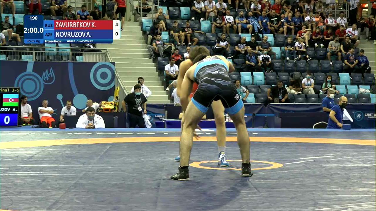 BRONZE FS - 65 kg: K. ZAVURBEKOV (RUS) v. A. NOVRUZOV (AZE) background