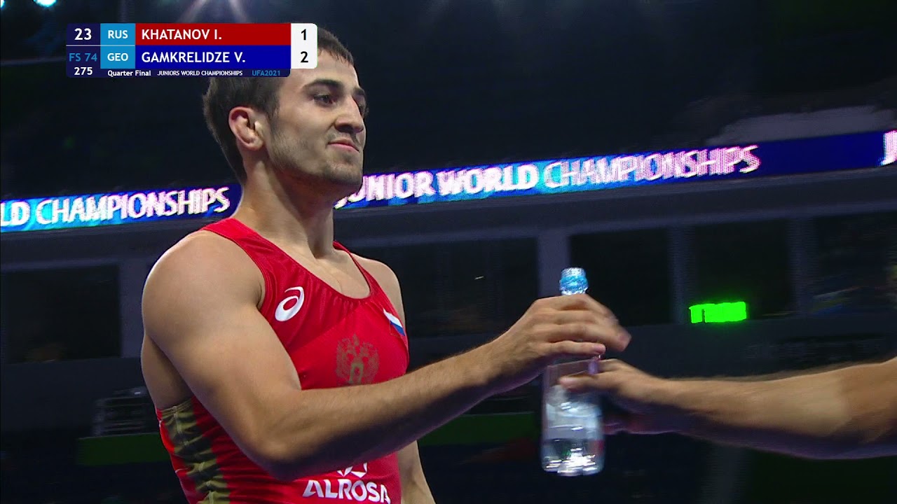 1/4 FS - 74 kg: I. KHATANOV (RUS) v. V. GAMKRELIDZE (GEO) background