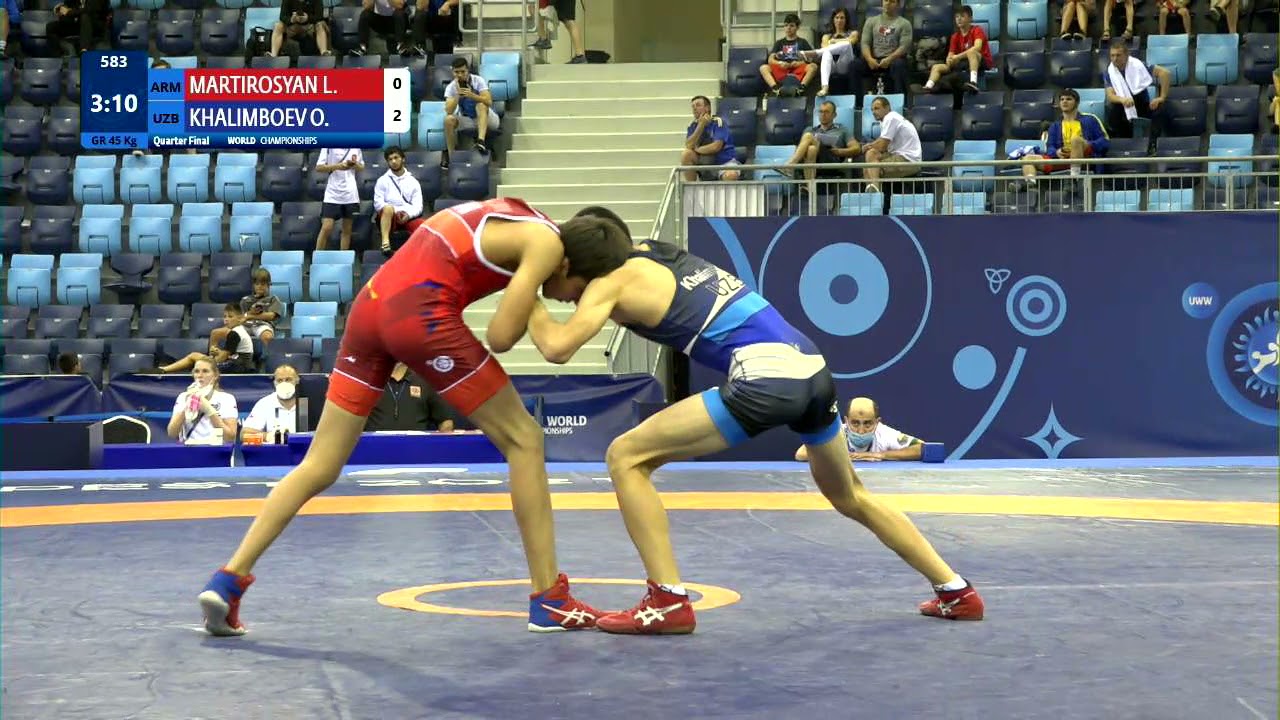 1/4 GR - 45 kg: L. MARTIROSYAN (ARM) v. O. KHALIMBOEV (UZB) background