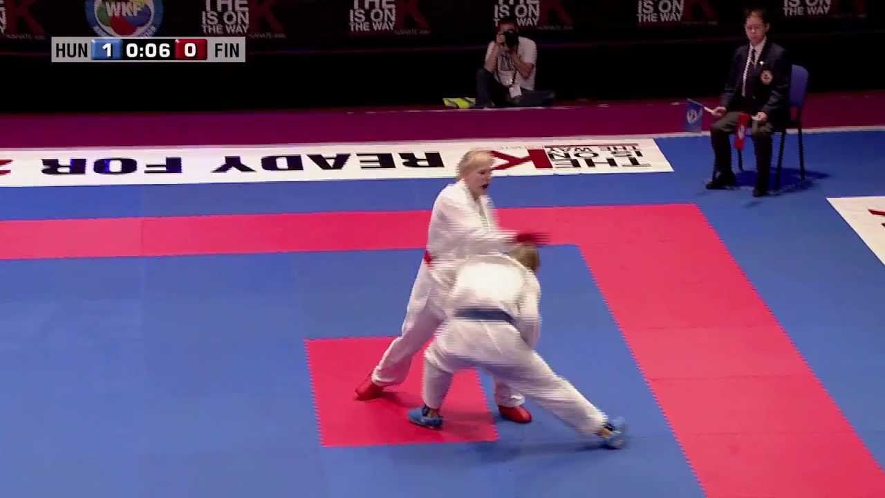 Nicola Bartha vs Helena Kuusisto. 48th European Karate Championships. Bronze Medal Kumite +68kg background