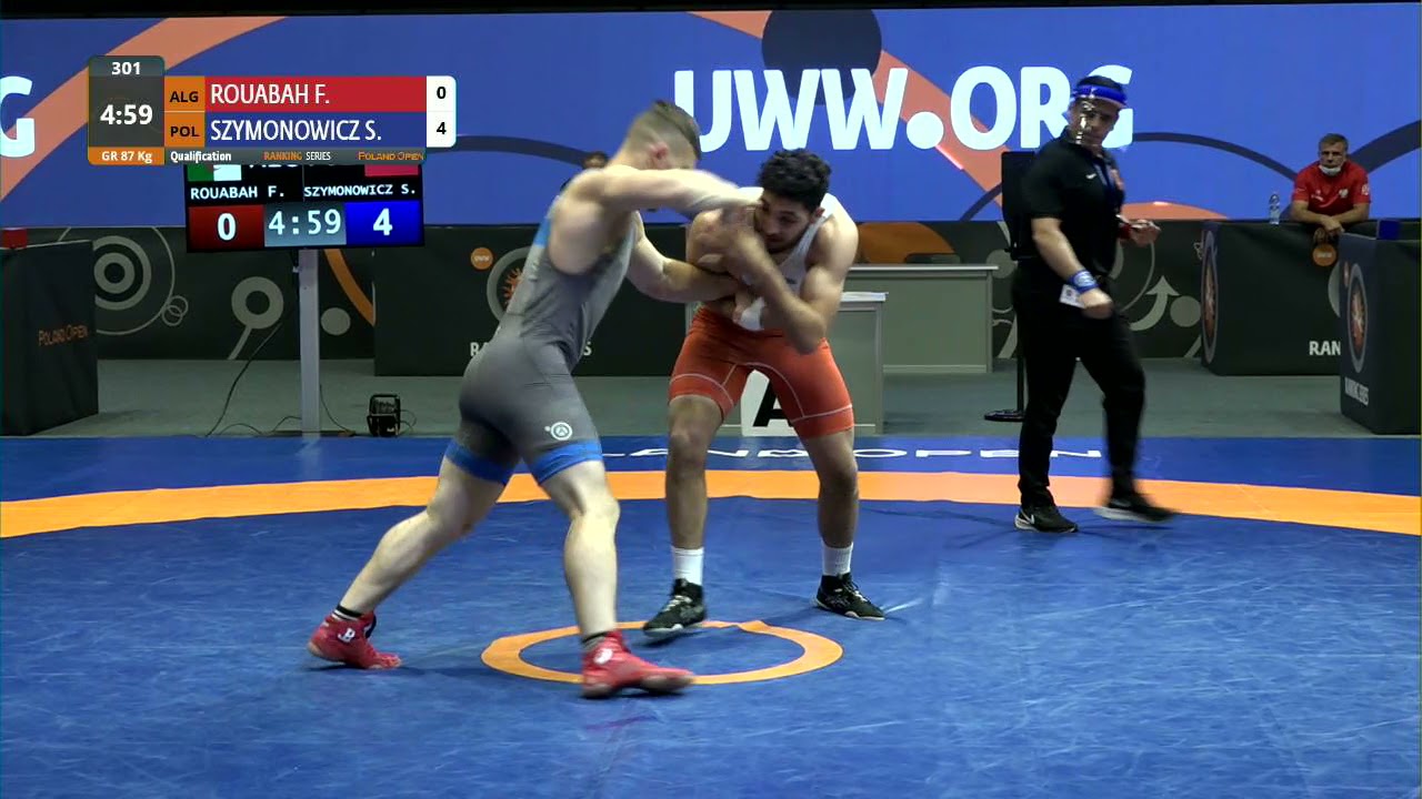 Qual. GR - 87 kg: F. ROUABAH (ALG) v. S. SZYMONOWICZ (POL) background