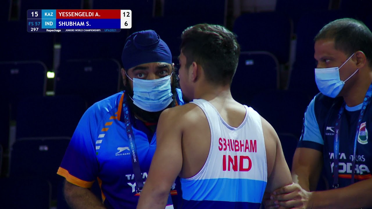 Repechage FS - 57 kg: A. YESSENGELDI (KAZ) v. S. SHUBHAM (IND) background