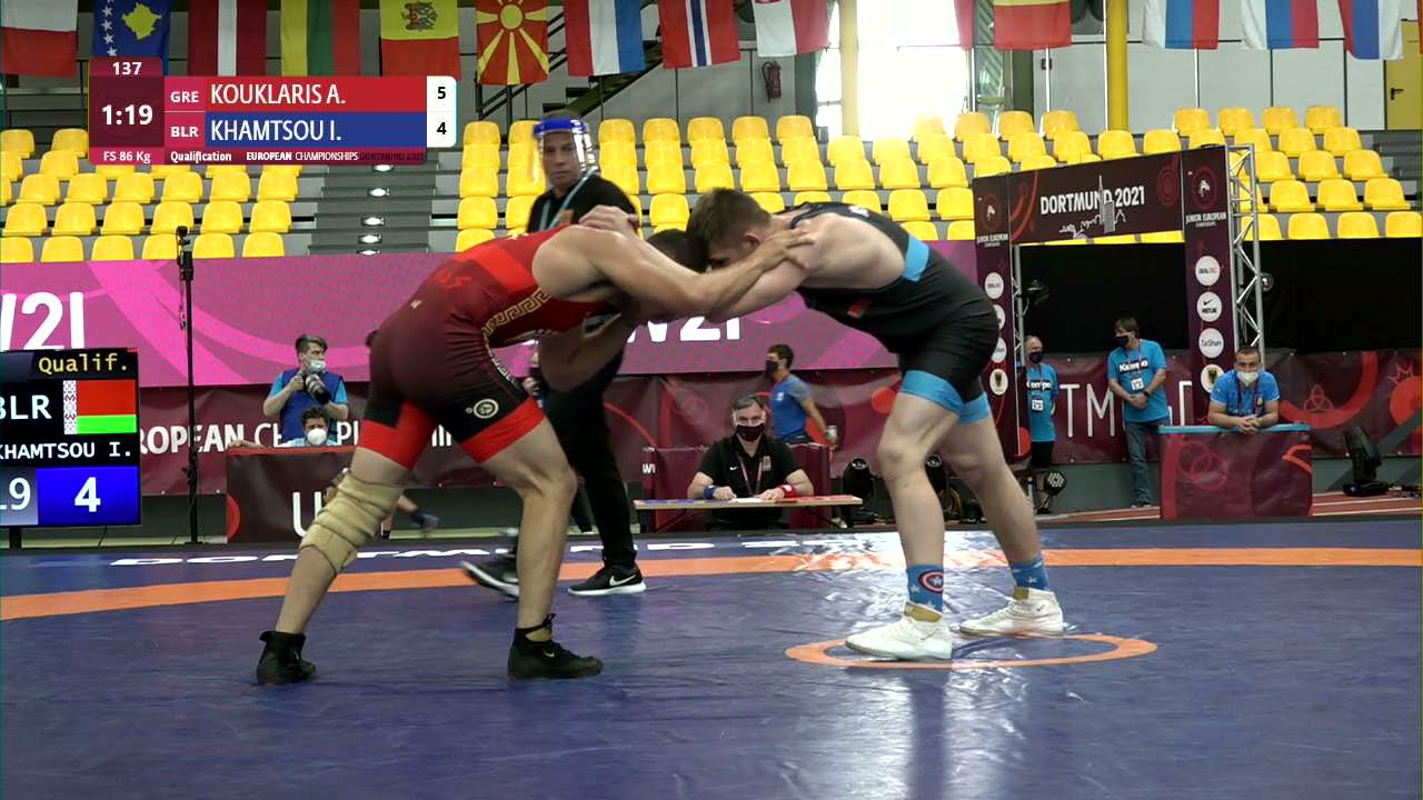 Qual. FS - 86 kg: A. KOUKLARIS (GRE) v. I. KHAMTSOU (BLR) background