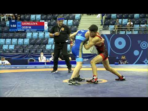 1/4 GR - 51 kg: N. SUIORKULOV (KGZ) v. M. GIGIEV (RUS) background