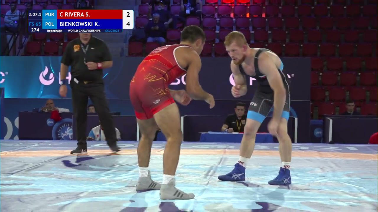 Repechage FS - 65 kg: S. C RIVERA (PUR) v. K. BIENKOWSKI (POL) background