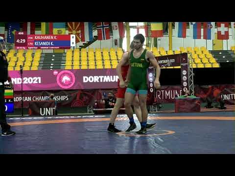 1/8 GR - 63 kg: K. KAUHANEN (FIN) v. K. KESANIDI (LTU) background