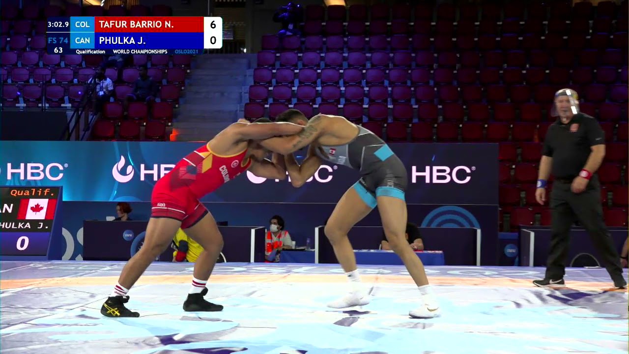Qual. FS - 74 kg: N. TAFUR BARRIO (COL) v. J. PHULKA (CAN) background