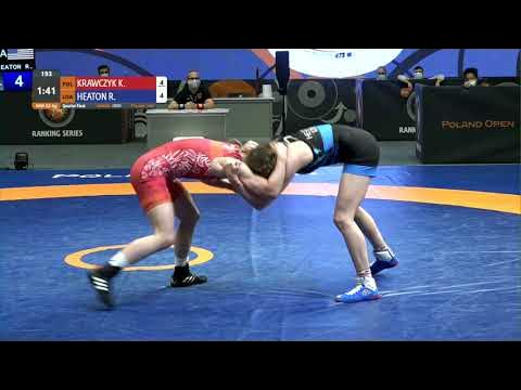 1/4 WW - 53 kg: K. KRAWCZYK (POL) v. R. HEATON (USA) background