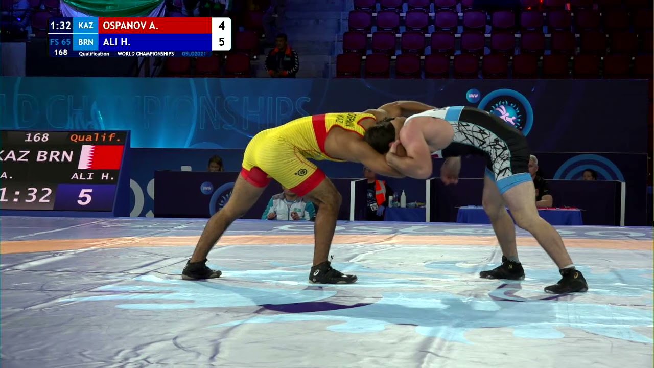 Qual. FS - 65 kg: A. OSPANOV (KAZ) v. H. ALI (BRN) background