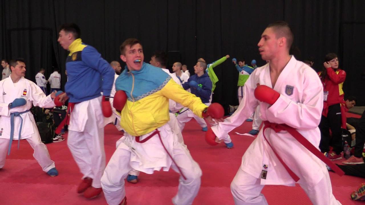 UKRAINE male team kumite warming up before the competition. 2016 European Karate Championships. backdrop