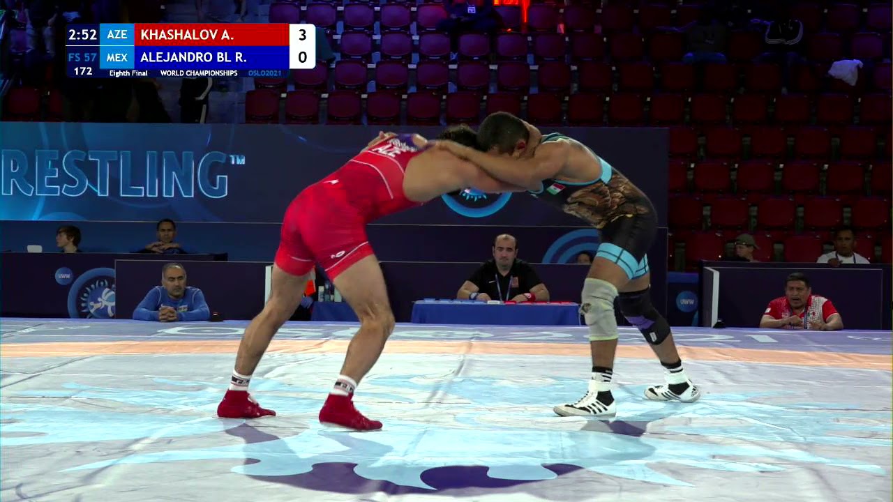1/8 FS - 57 kg: A. KHASHALOV (AZE) v. R. ALEJANDRO BL (MEX) background