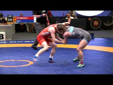Qual. WW - 57 kg: V. CHUMIKOVA (RUS) v. P. GIL (POL) background